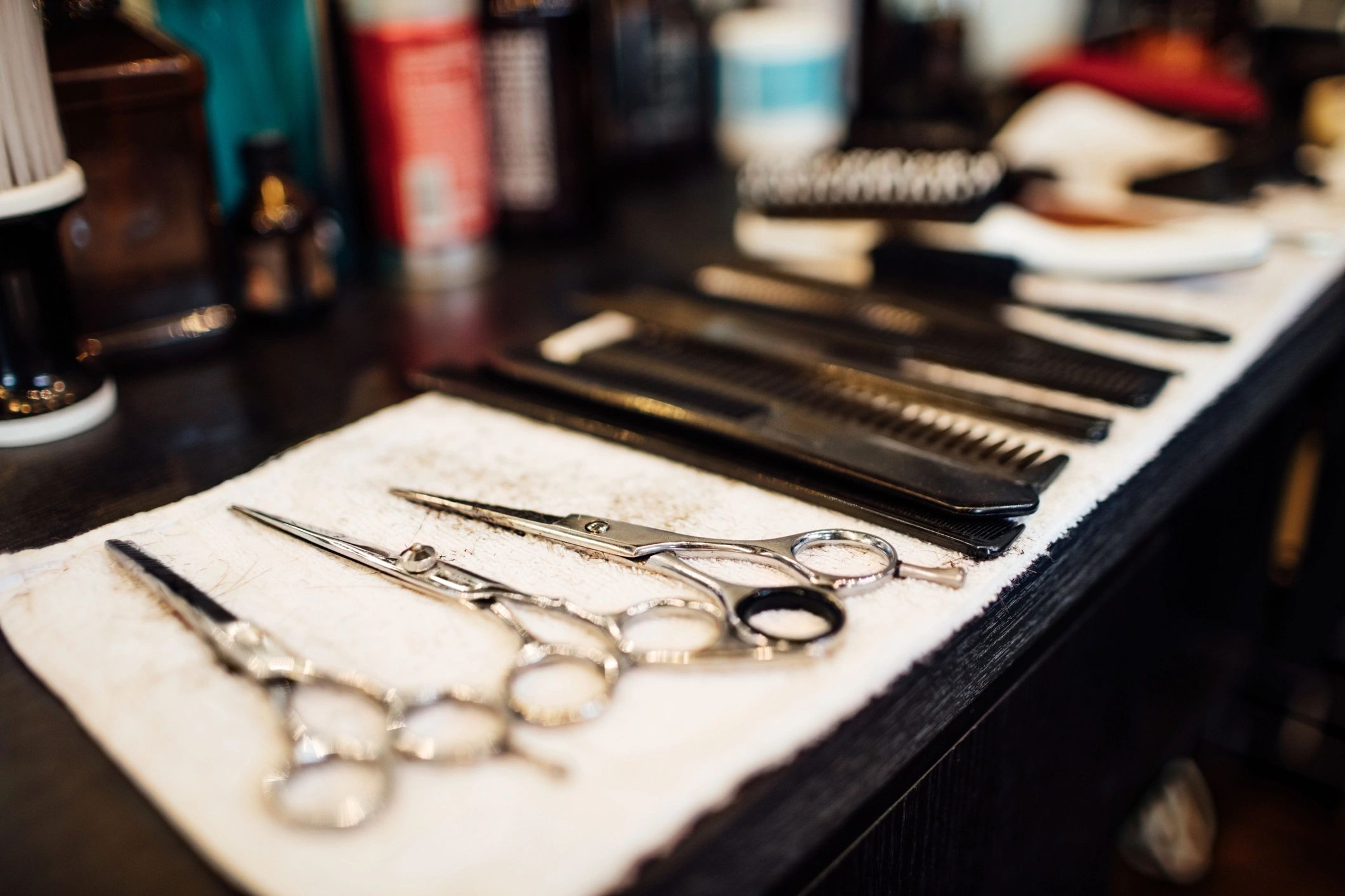 Barber tools including scissors and combs ready for a service