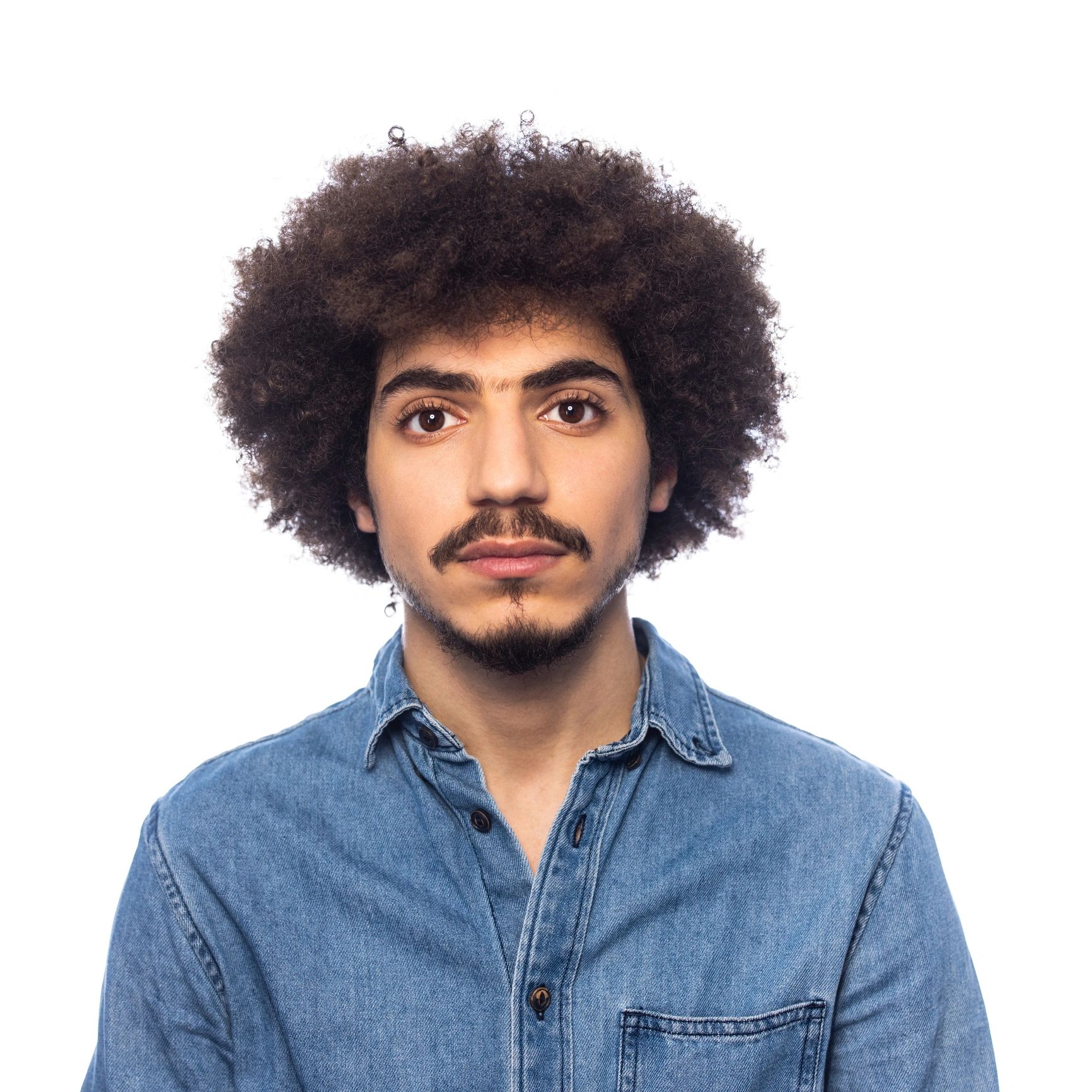 Client portrait showing a clean beard line and grooming